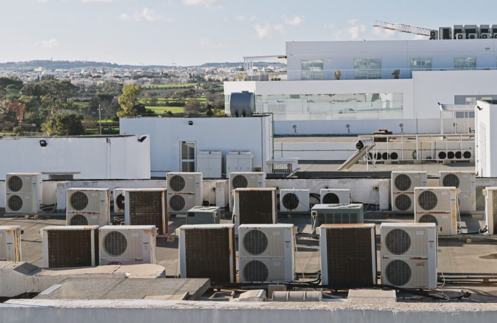 industrial air conditioning and ventilation units on rooftop building