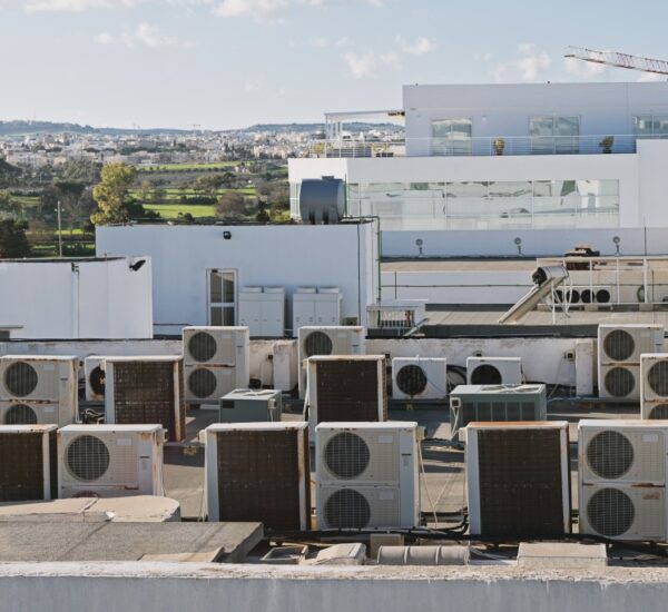 industrial air conditioning and ventilation units on rooftop building