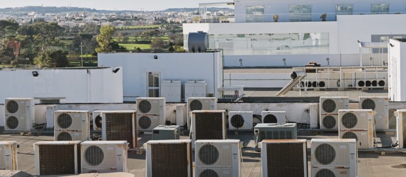 industrial air conditioning and ventilation units on rooftop building